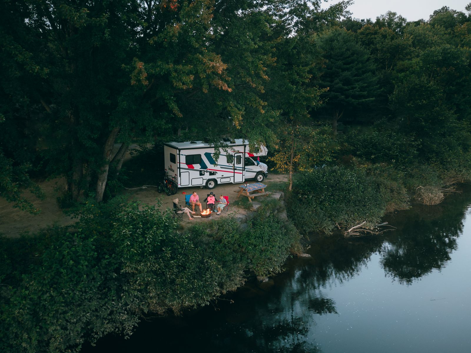 Compact Motorhome MHC Canada Enjoying Family Time While Camping In An RV